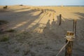 Beautiful view of a shadow of a couple on the sand