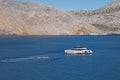 Beautiful view of a ship in the sea in Nimburio bay, Symi island, Greece. Royalty Free Stock Photo