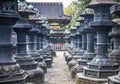 Beautiful view of a shrine through black temple pillars in Tokyo, Japan Royalty Free Stock Photo