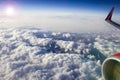 Beautiful view of the sky from the airplane window, clouds, sun