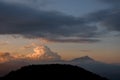 beautiful view of sky with big colorful clouds over mountain silhouette. Beauty in nature.