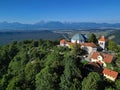 Smarna gora church and Kamnik Alps Royalty Free Stock Photo