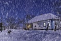 Beautiful view of the snow-covered house at night during heavy snowfall. Everything is covered in snow. Royalty Free Stock Photo