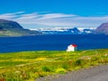 Beautiful view of snow mountain and a red roof house Royalty Free Stock Photo