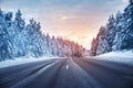 Beautiful view of the snowy curve country road in winter Royalty Free Stock Photo
