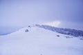 Beautiful view of a snowy house in the mountains