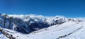 Beautiful view of snowy mountains peaks. winter nature. winter resort.Panorama of winter mountains in Caucasus region