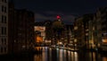 Beautiful view of the spectacular architecture of the city of Amstrerdam in Netherlands at night