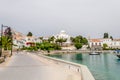 Beautiful View of Spetses Town with Traditional Neoclassic Buildings and White Cathedral Church by the Sea