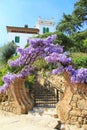 Beautiful view of stairs and purple flowers. Traditional spanish white house in Barcelona, Spain Royalty Free Stock Photo