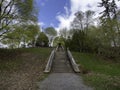 Beautiful view of the stairs and the trees in Strathcona Park in Canada Royalty Free Stock Photo
