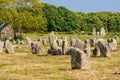 Beautiful view of the standing stones alignments, menhirs, in Carnac, Brittany, France. Megalithic landmark Royalty Free Stock Photo