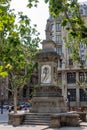 Beautiful view of a statue with historic buildings in downtown Barcelona, Spain Royalty Free Stock Photo