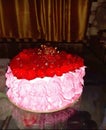 This is the beautiful view of strawberry flavour cake with pieces of cherry