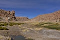 Beautiful view of the stream between mountains full of lush vege Royalty Free Stock Photo