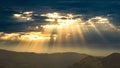 Beautiful view of sunbeams penetrating through the clouds.