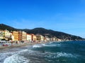 Beautiful view on a sunny day of the sea and the town of Alassio with colorful buildings, Liguria, Italian Riviera, region San Royalty Free Stock Photo