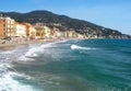 Beautiful view on a sunny day of the sea and the town of Alassio with colorful buildings, Liguria, Italian Riviera, region San Royalty Free Stock Photo