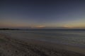 Beautiful view of sunset in Atlantic ocean from sandy beach of island of Aruba. Royalty Free Stock Photo