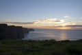 Beautiful view of a sunset at The Cliffs of Moher in County Clare, Ireland Royalty Free Stock Photo