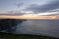 Beautiful view of a sunset at The Cliffs of Moher in County Clare, Ireland Royalty Free Stock Photo