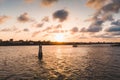 Beautiful view of the sunset in the cloudy sky over the sea in Mombasa, Kenya Royalty Free Stock Photo