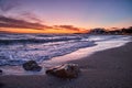 Beautiful view of sunset in Marbella with nice rocks in the foreground