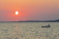 Beautiful view of sunset in the Mediterranean Sea with parked motor boat. Royalty Free Stock Photo