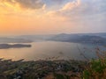 Beautiful view of the sunset and mountains from Sajjangad, satara, Maharashtra, India. Royalty Free Stock Photo