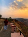 Beautiful view of the sunset and mountains from Sajjangad, satara, Maharashtra, India. Royalty Free Stock Photo