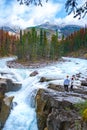 Beautiful view of Sunwapta Falls Jasper National Park, Canada, couple men and woman visit Sunwapta Falls Jasper Royalty Free Stock Photo