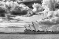 Beautiful view of the Sydney Opera House in black and white against a dramatic sky, Australia Royalty Free Stock Photo