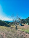 Tent on mountain peak travel scene Royalty Free Stock Photo