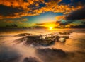 Beautiful view of tidepools reflecting on a nice sunset sky Royalty Free Stock Photo