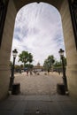 Beautiful view to the France Institute and Pont des Arts through a arch gate of Louvre Museum