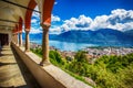 Beautiful view to Locarno city, lake Maggiore and Swiss Alps from Madonna del Sasso Church in Ticino, Switzerland