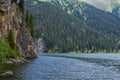 Beautiful view to Middle Kolsai or Mynzhylky lake with mountains background.