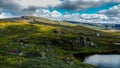 Norwegian natural park Hardangervidda with small lakes and cabins