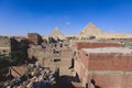 Beautiful View to the One of the Wonders of the Ancient World - Great Pyramids of Giza under Blue Sky and Day Lights of the Sun Royalty Free Stock Photo