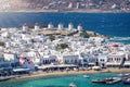 Beautiful view to the traditional windmills above the town of Mykonos island, Cyclades, Greece Royalty Free Stock Photo