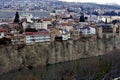 Beautiful view on top of the house on the edge of the cliff of the Kura river in Tbilisi Royalty Free Stock Photo