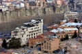 Beautiful view on top of the house on the edge of the cliff of the Kura river in Tbilisi Royalty Free Stock Photo