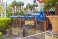 Beautiful view of tourists having breakfast at outdoor hotel restaurant. Las Vegas.