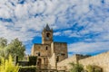 View of a tower and its garden of castle the alcazaba of Antequera Spain