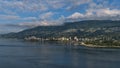 Beautiful view of town West Vancouver, British Columbia, Canada on the shore of Burrard Inlet with Ambleside Park.