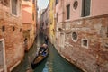 Beautiful view of traditional Gondolas with tourist on famous Canal Grande in Venice, Italy