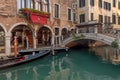 Beautiful view of traditional Gondolas with tourist on famous Canal Grande in Venice, Italy