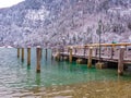 Beautiful view of traditional wooden boat port house at the shores of famous Lake Obersee KÃÂ¶nigssee