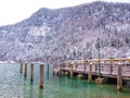 Beautiful view of traditional wooden boat port house at the shores of famous Lake Obersee KÃÂ¶nigssee