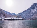 Beautiful view of traditional wooden boat port house at the shores of famous Lake Obersee KÃÂ¶nigssee